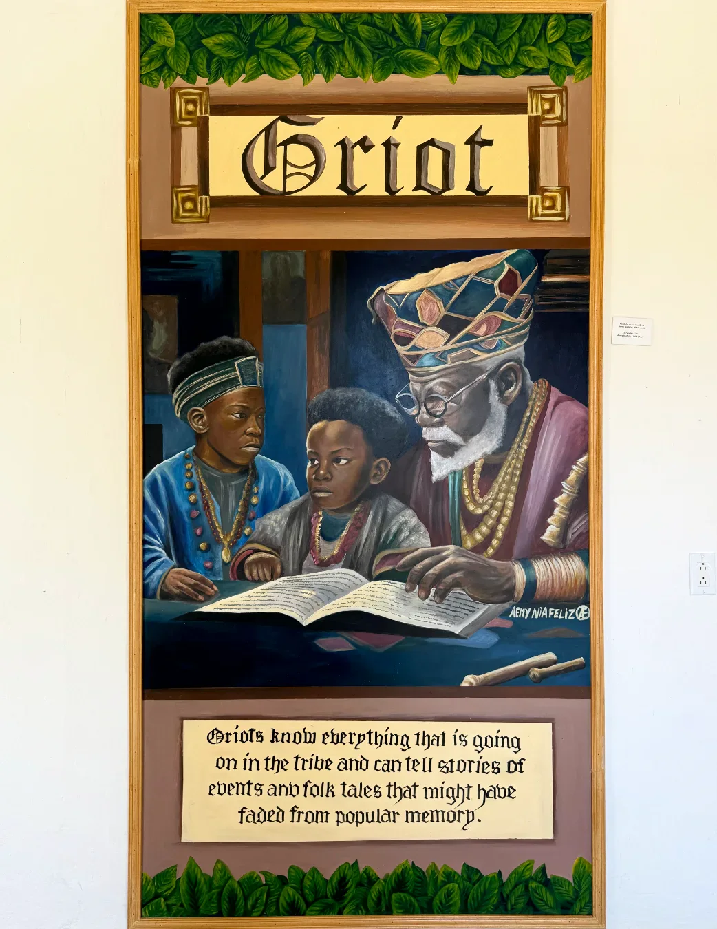 Wall painting titled Griot: a storyteller with children and a book